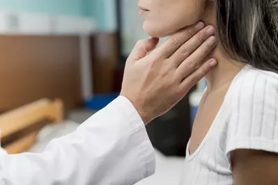 doctor checking throat