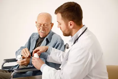 doctor giving medicine to patient