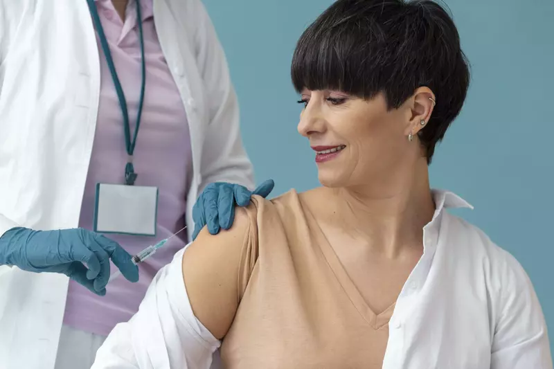 woman getting a vaccine