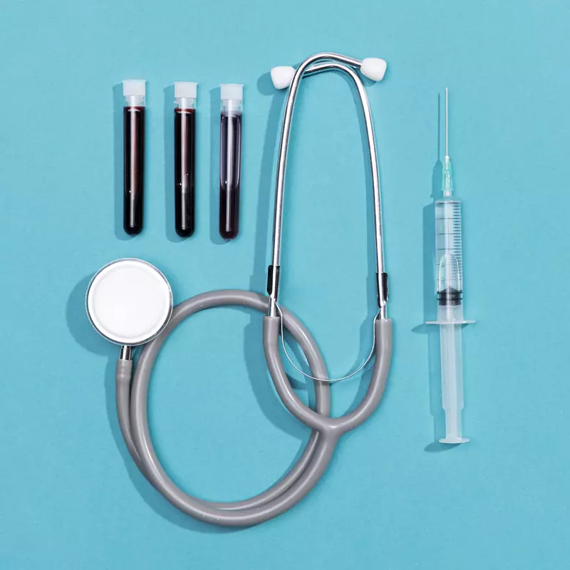 stethoscope and syringe