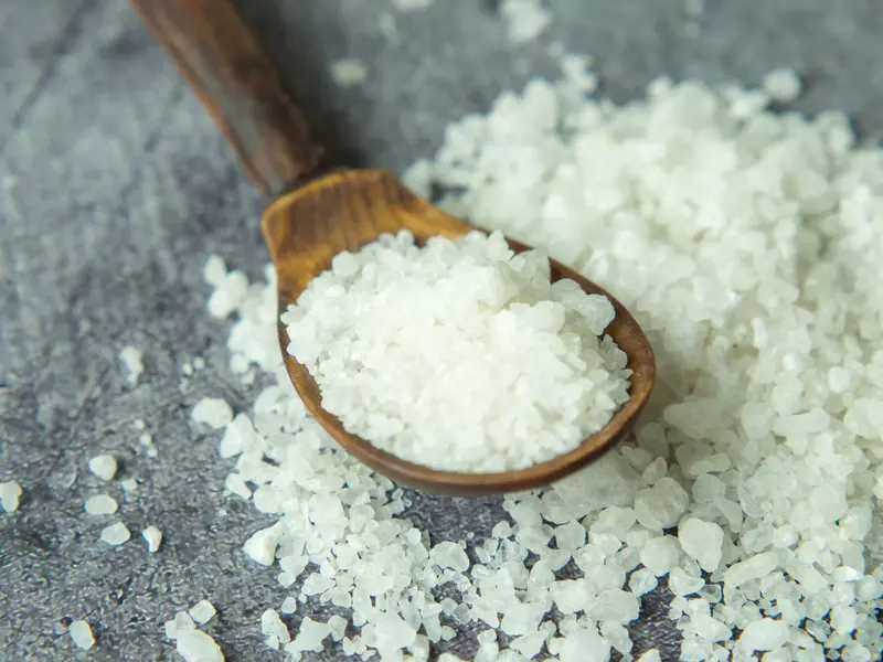 sea salt on wooden spoon