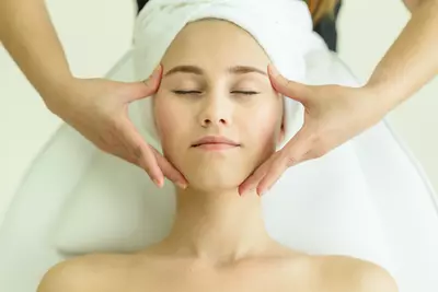 woman getting temple massage